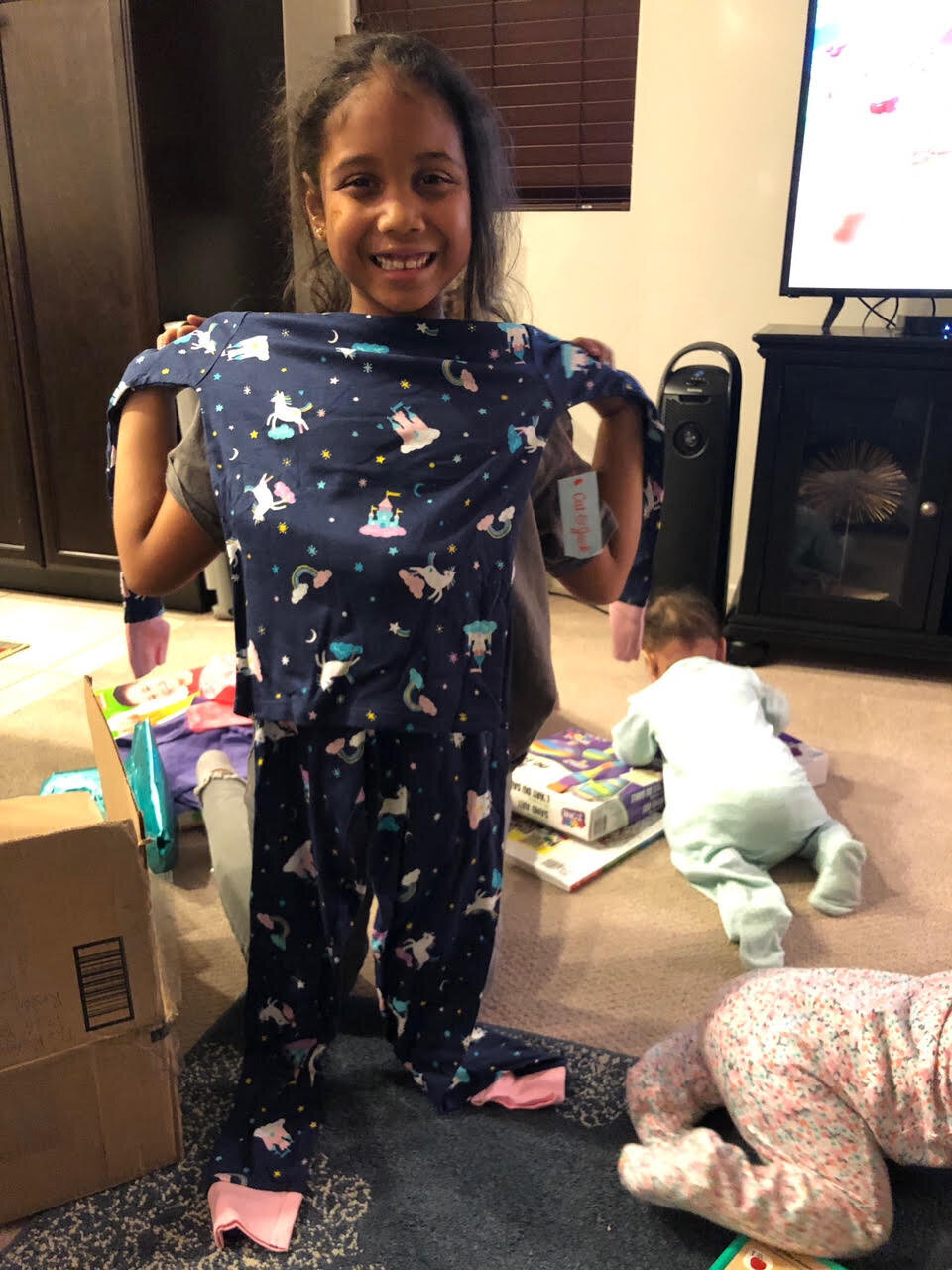 smiling girl with new pajamas